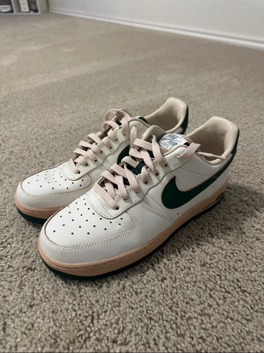 Nike Low-Top Sneakers in Cream with Dark Green Swoosh and Tan Sole